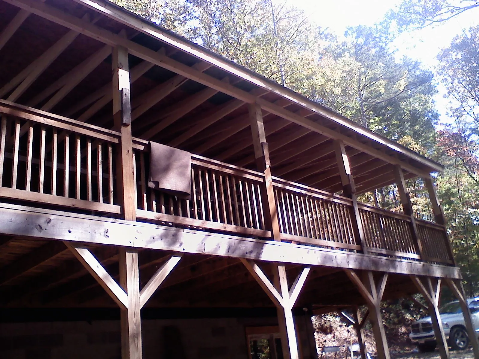 Timber framing under a new elevated porch and deck — Roof Leak Repair in Wilkesboro by Roofing Brothers
